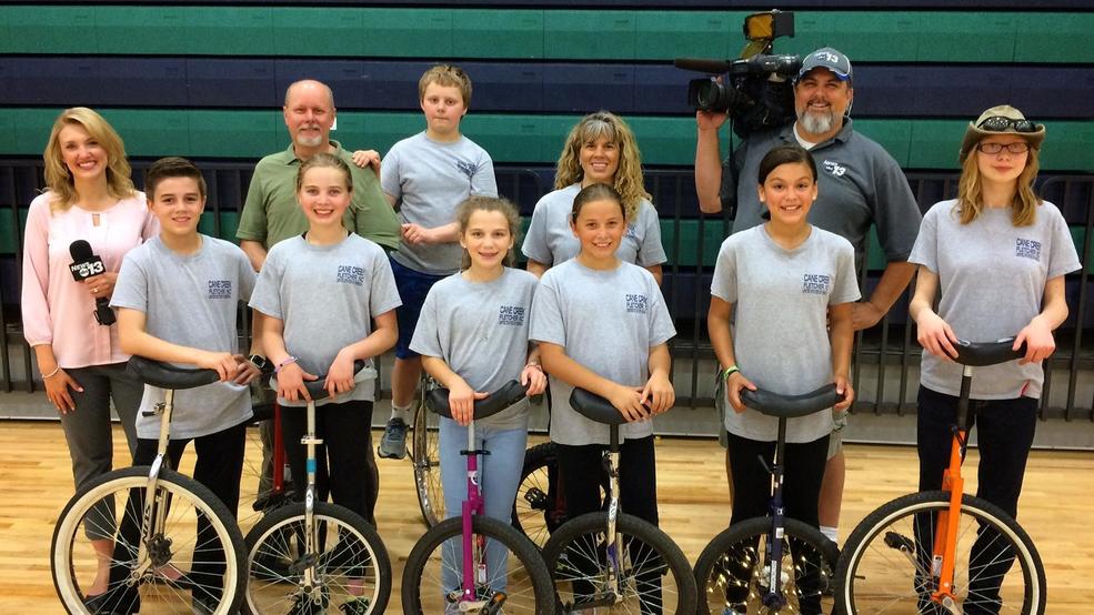 Cane Creek Middle unicycling club holds free clinic WLOS
