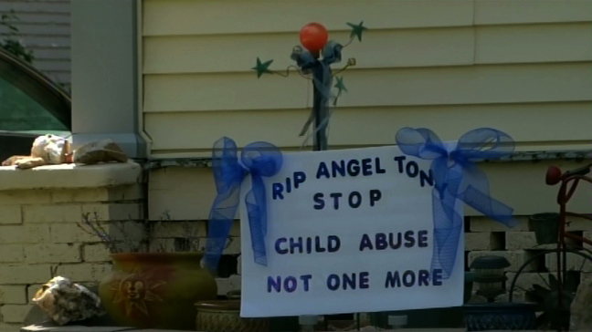 Neighbor upset about death of young boy uses yard sign to voice concern