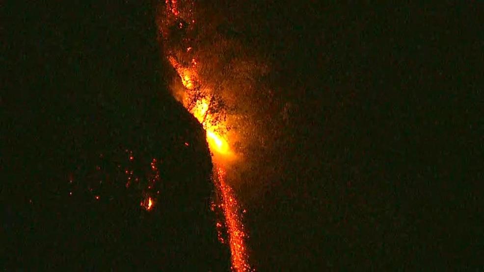 Fire burning in cliffs above Oneonta Falls in the KATU