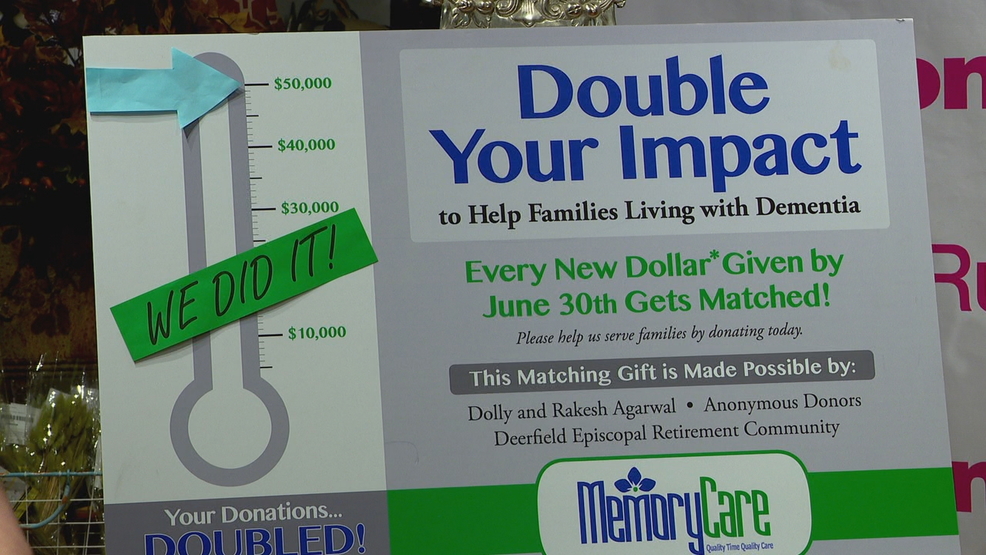 Rug Home Owners Present Asheville Memory Care Center With 25k